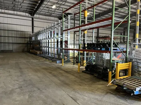 Cantilever racking along a warehouse wall